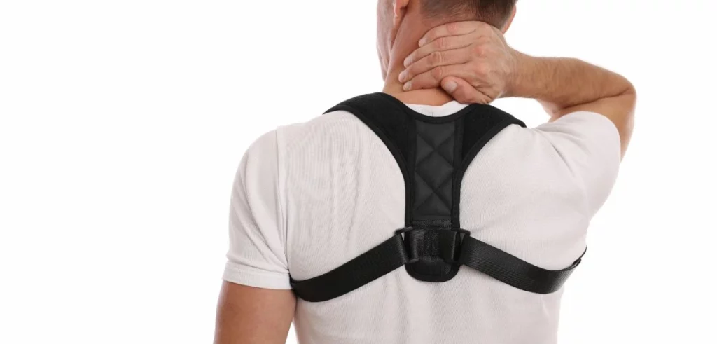 guy touching his neck lady while wearing Kizu Spine